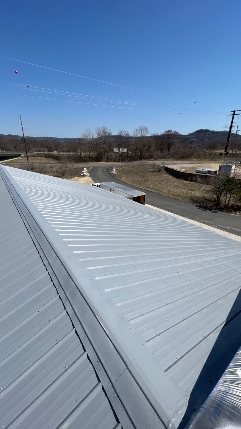 New metal roof installation on commercial building