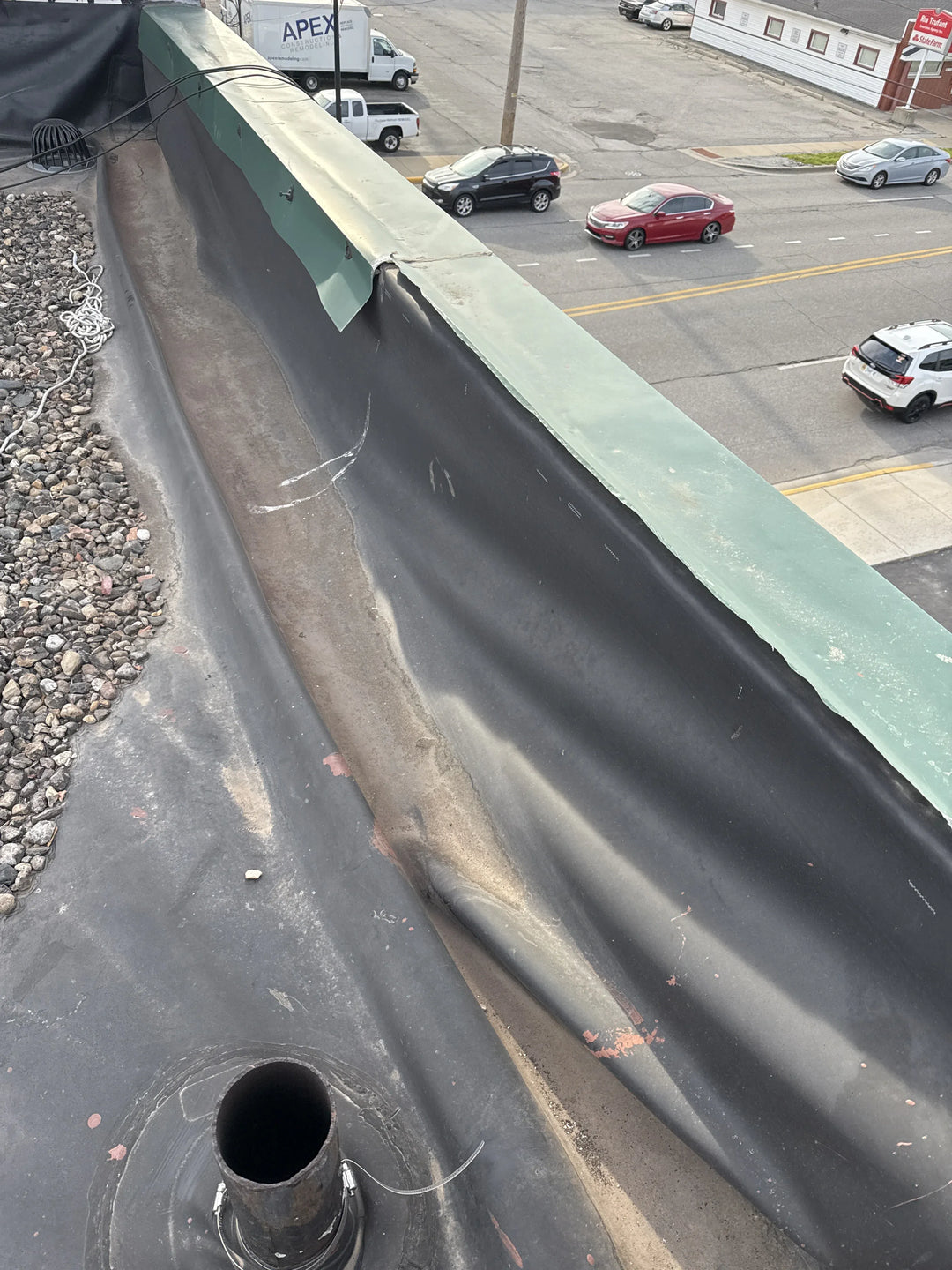 Close-up of a roof with a visible pipe
